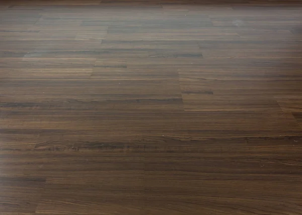 Piso laminado de madera marrón barniz interior en el diseño moderno del hogar —  Fotos de Stock