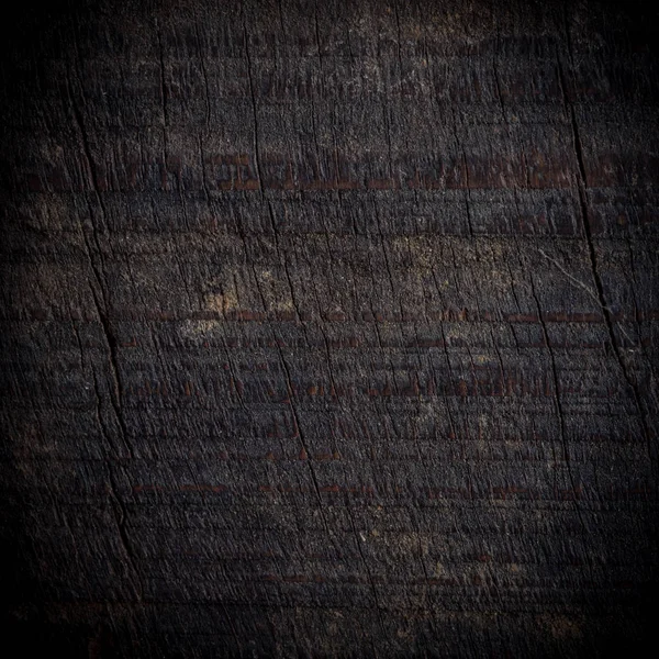 Latar belakang kayu gelap, tekstur permukaan butir kasar papan kayu — Stok Foto