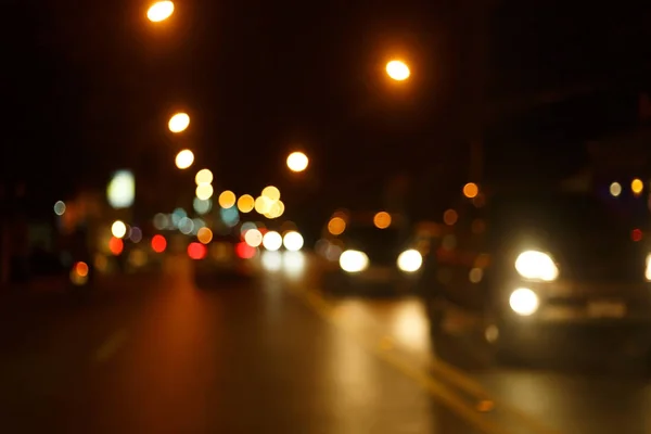 Traffic light of driving car on city night street road — Stock Photo, Image