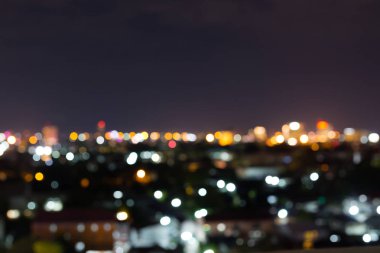 Şehir gece karanlık gökyüzü, soyut bulanıklık bokeh açık renkli ile