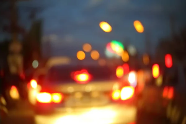 Traffic light of driving car on city night street road — Stock Photo, Image