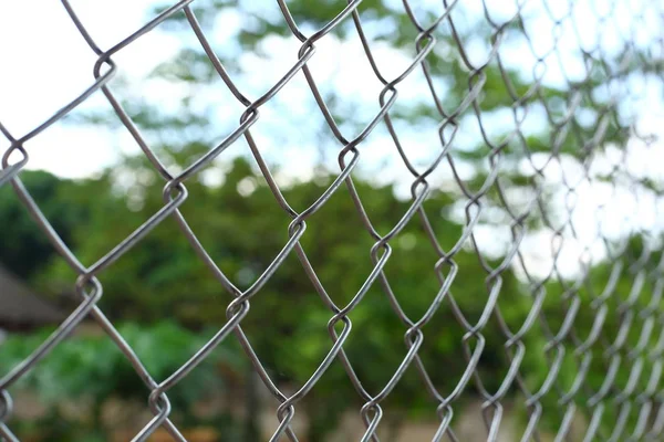 Chain link wire fences enclose border area — Stock Photo, Image