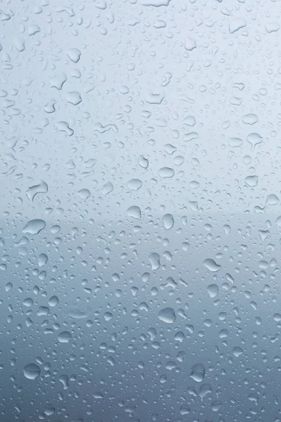 Gotas de lluvia en el coche con revestimiento de vidrio piel de protección — Foto de Stock