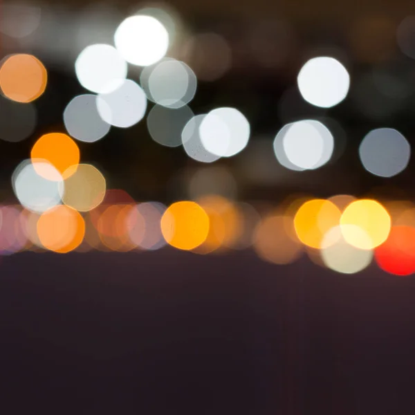 City night with dark sky, abstract blur bokeh light background — Stock Photo, Image