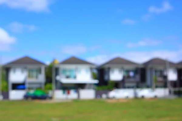 Casa residencial aldeia subúrbio, imagem borrão fundo — Fotografia de Stock