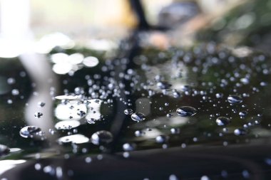 su yağmur damlacığı cam kaplama deri ile siyah araba