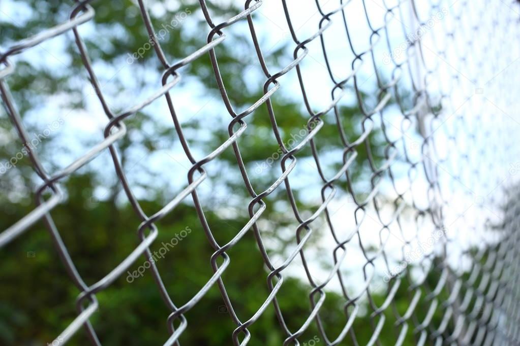 chain link wire fences enclose border area