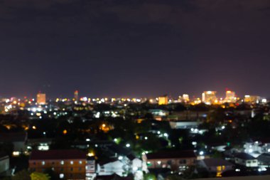 Şehir gece karanlık gökyüzü, soyut bulanıklık bokeh açık renkli ile