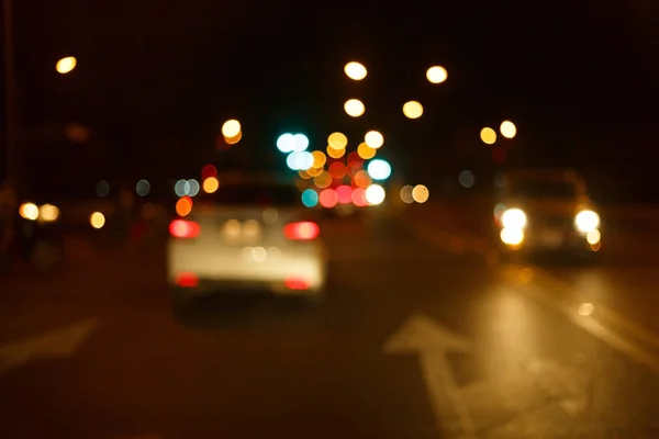 Traffic light of driving car on city night street road — Stock Photo, Image