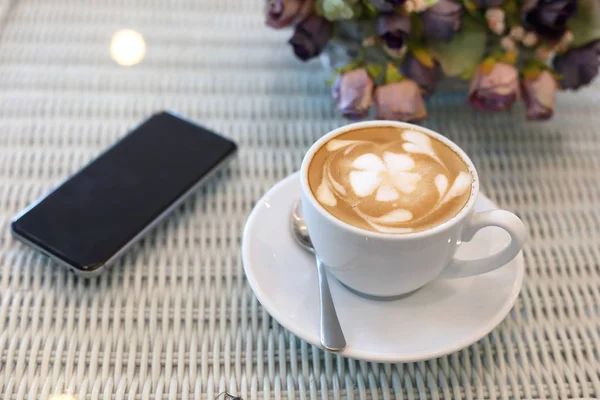 Beautiful frangipani plumeria flower art latte of hot coffee — Stock Photo, Image