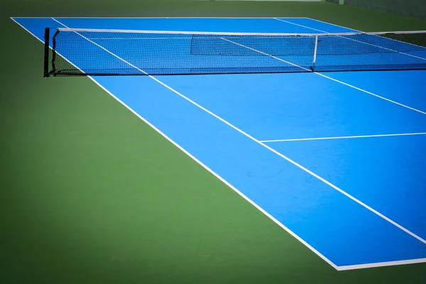 Blauwe en groene tennisbaan — Stockfoto