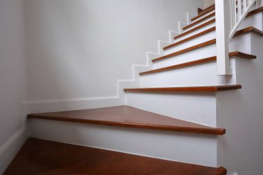 brown wooden hardwood stair in modern residential house clipart