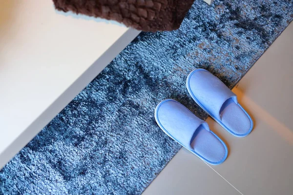 blue slipper and carpet floor softness inside home living room