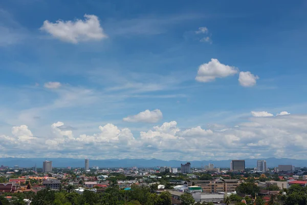 stock image white cloud on blue sky above the town, aerial view cityscape