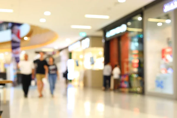 Imagem borrão pessoas cliente multidão andando no shopping center de negócios — Fotografia de Stock