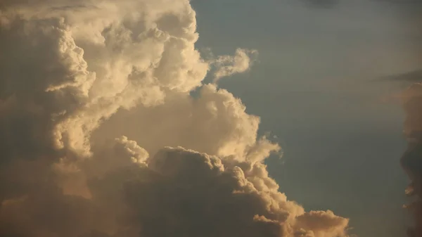 Golden cloud on dramatic sunset sky background — Stock Photo, Image