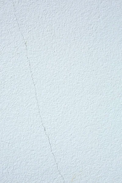 Crack op witte muur cement concrete textuur achtergrond — Stockfoto