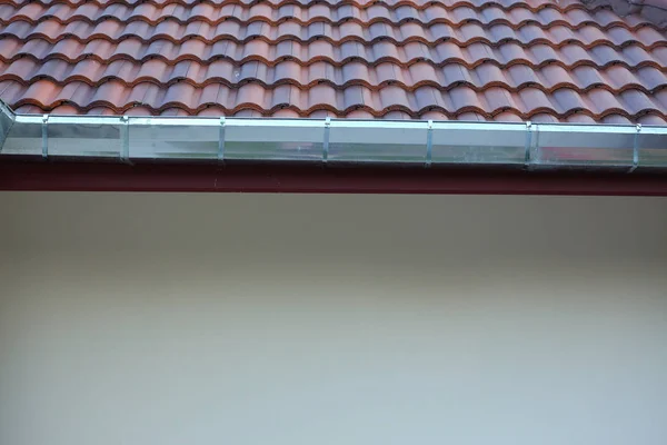 stainless steel of roof gutter on residential house