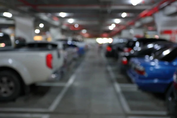 Ondergronds van parkeerplaats in Business Building, Blur image achtergrond — Stockfoto