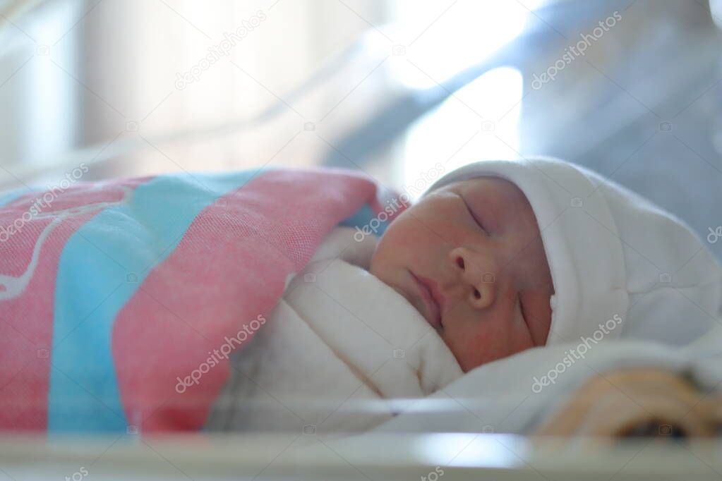 cute little newborn baby sleeping sweet dream in soft blanket