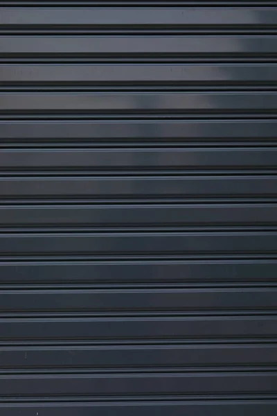 Schwarzer Rollladen Tür geschlossen Sicherheitshintergrund — Stockfoto