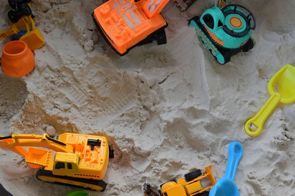 Small kid toy vehicle construction in sand playground — Stock Photo, Image