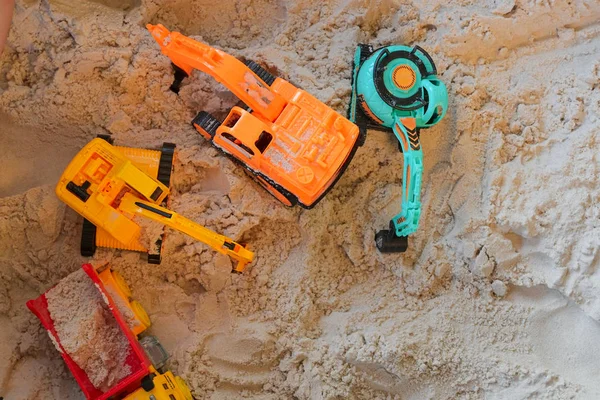 Small kid toy vehicle construction in sand playground — Stock Photo, Image