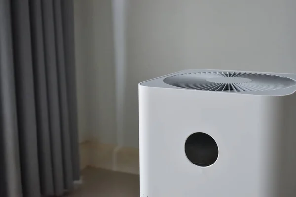 Sistema purificador de aire limpieza de polvo pm 2.5 contaminación en la sala de estar —  Fotos de Stock