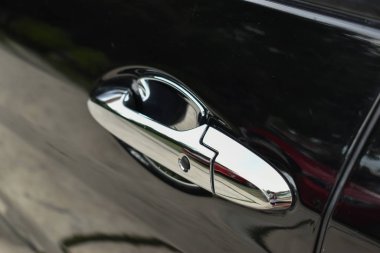vehicle part of door handle on black modern car