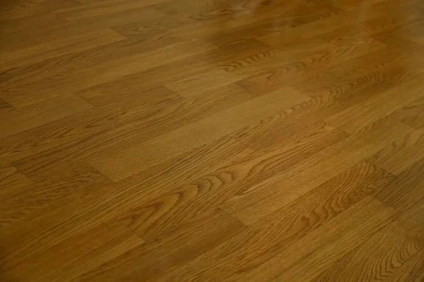 Brązowy drewno laminat czyste podłogi polerowane w domu — Zdjęcie stockowe
