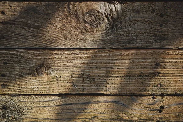 Light and shadow on wood barn wall plank texture background, top view of old wooden table — 스톡 사진