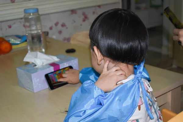 Cute baby boy haircut in home — 스톡 사진