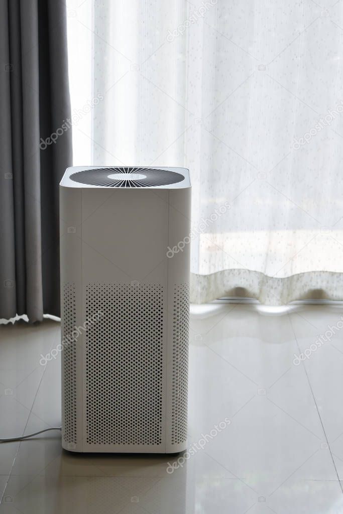 air purifier system cleaning dust pm 2.5 pollution in living room