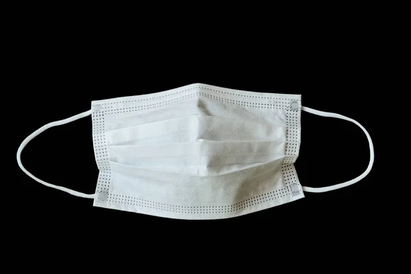 Topeng Wajah Kebersihan Medis Terisolasi Pada Latar Belakang Hitam — Stok Foto