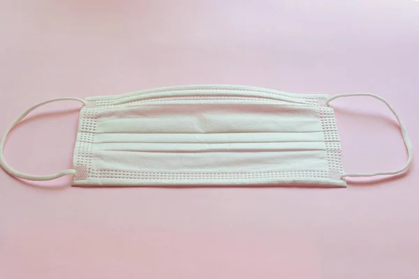 Medische Hygiëne Gezichtsmasker Roze Achtergrond — Stockfoto