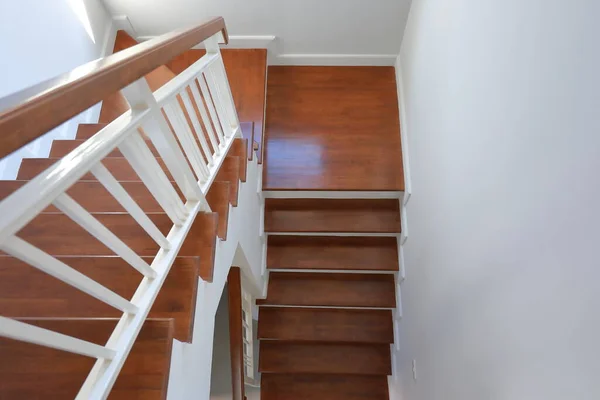 brown wooden stair interior decorated modern style of residential house