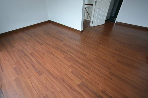 brown wood laminate floor in residential house