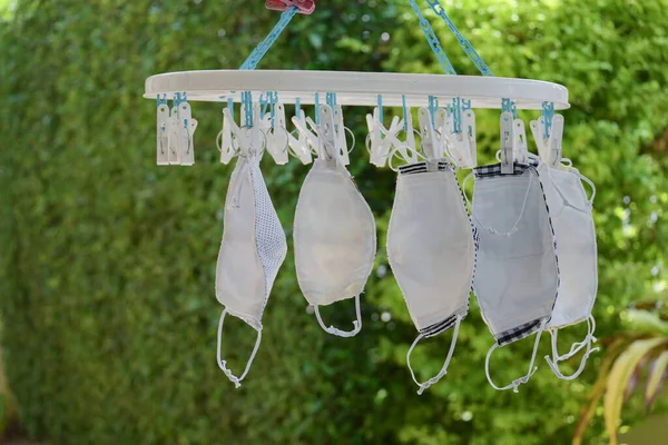 washing clean fabric mask hanging dry disinfect for wearing reuse