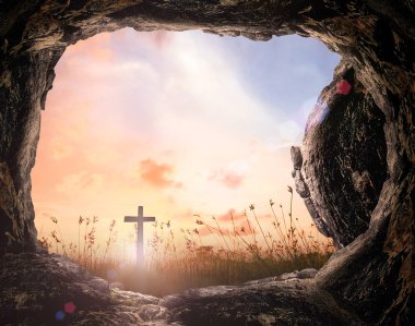 Resurrection of Jesus Christ concept: Tomb empty with cross at sunrise background clipart