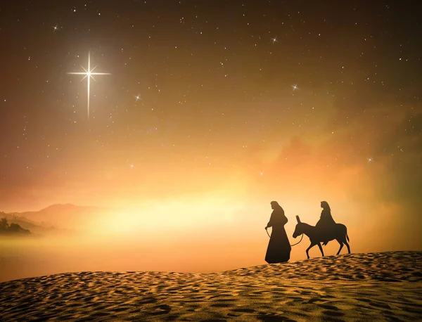 耶稣诞生圣诞节概念 剪影怀孕的玛丽并且约瑟夫与驴在十字架背景星 — 图库照片