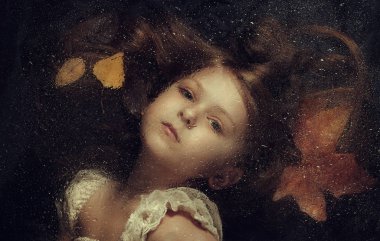 Little caucasian girl, close up portrait across a water drops clipart