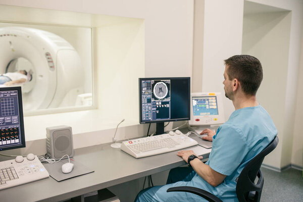 Consulting MRI of the leg with professional radiologist