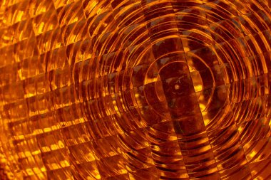 Turuncu uyarı ışığı dokusu. Yakın plan..