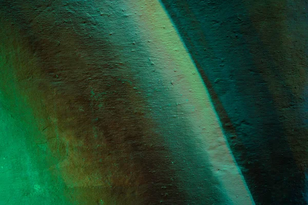 Green gradient abstract colorful wall. Close-up of a graffiti texture. Street art background.