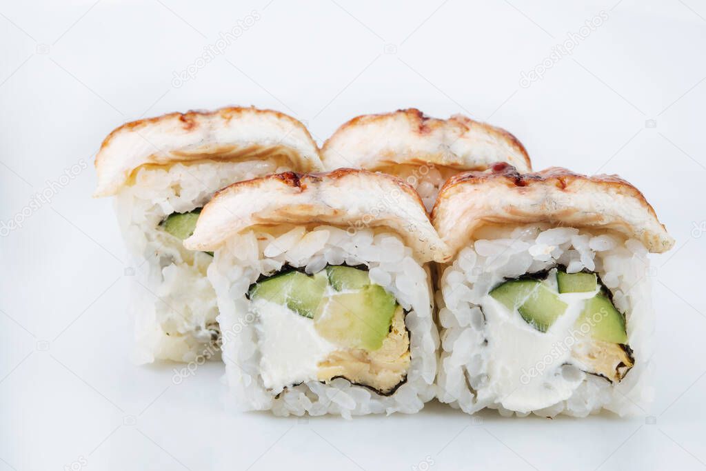 Fresh japanese sushi rolls on a white background