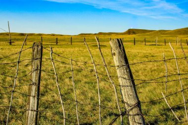 Dixon Ranch in summer. Grasslands. National Park, Saskatchewan, Canada clipart