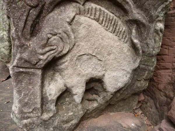 Superb carvings at the historical temple of Phimai in Thailand