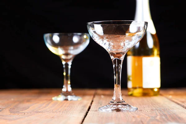 Sparkling wine and two glasses on table — Stock Photo, Image