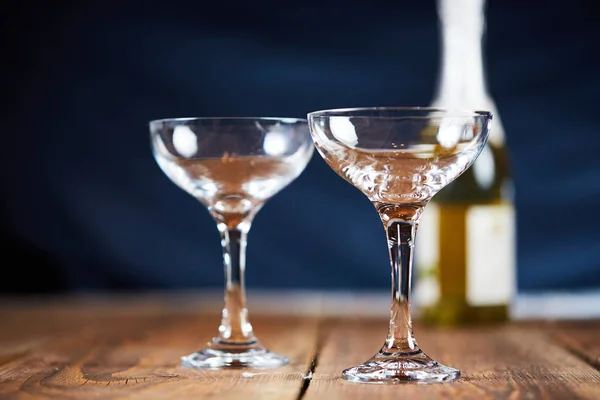 Two empty sparkling wine glasses on table — Stock Photo, Image