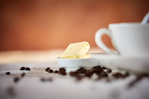 Makro skott av smör för bulletproof coffee — Stockfoto